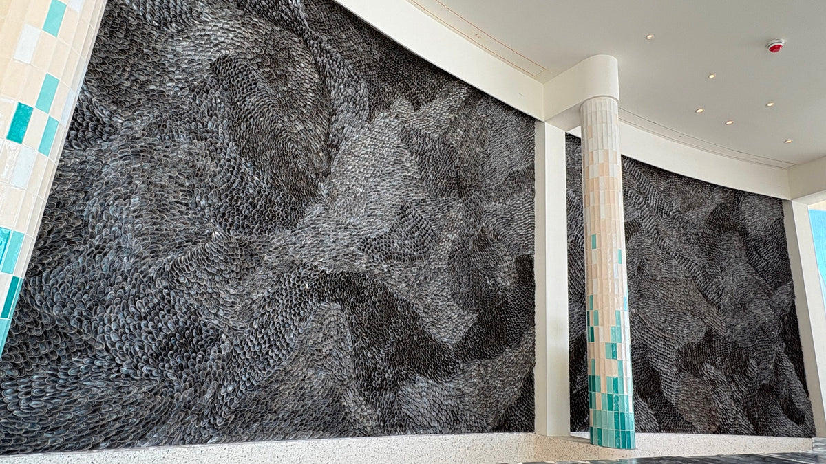 The finished Fields of Mytilus shell wall in the lobby of Nammos Resort Amaala